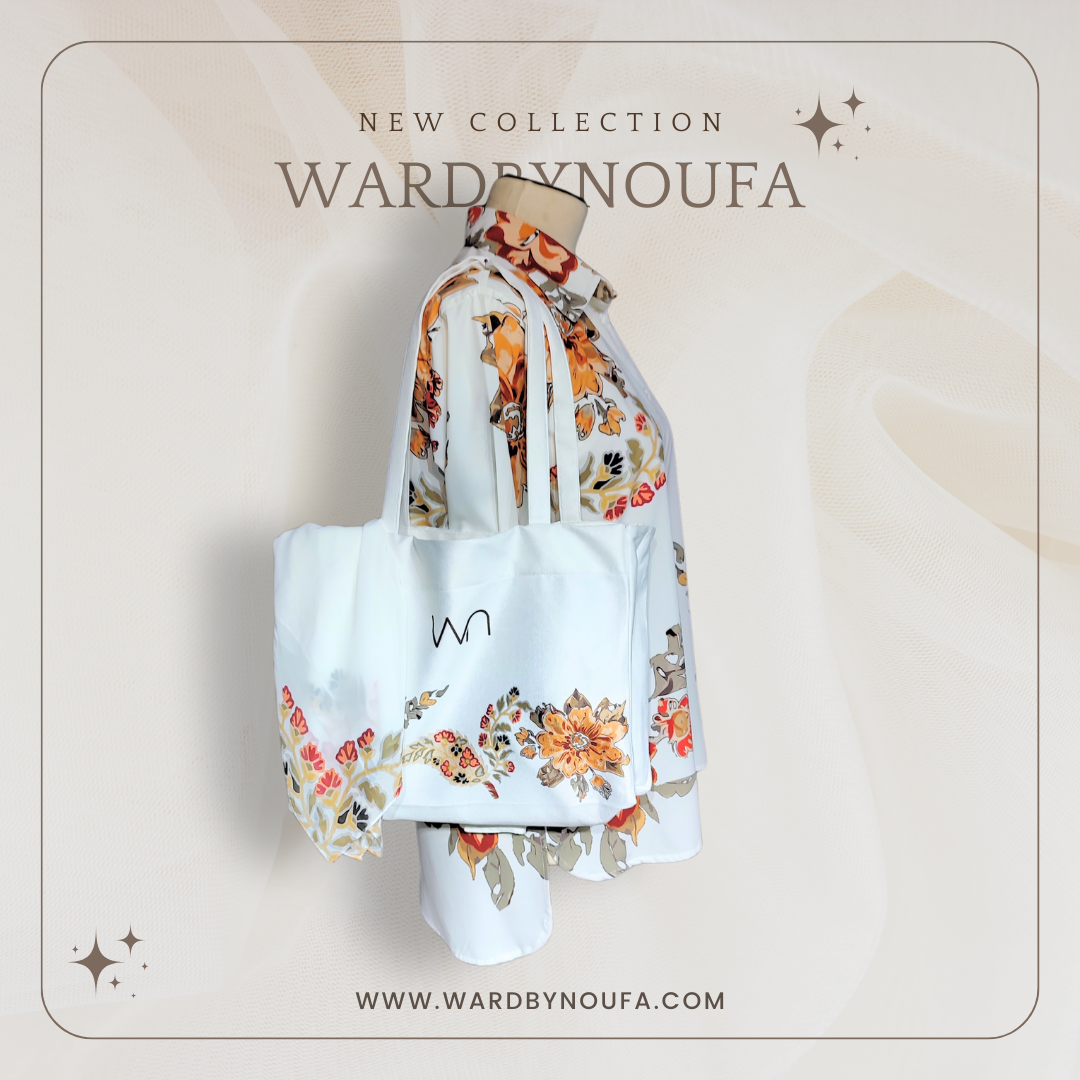 A white button-down shirt comes with a scarf in a matching patterned bag.