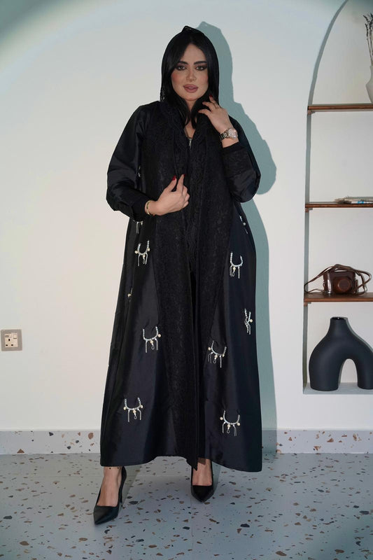 Black abaya with lace and gemstone accessories